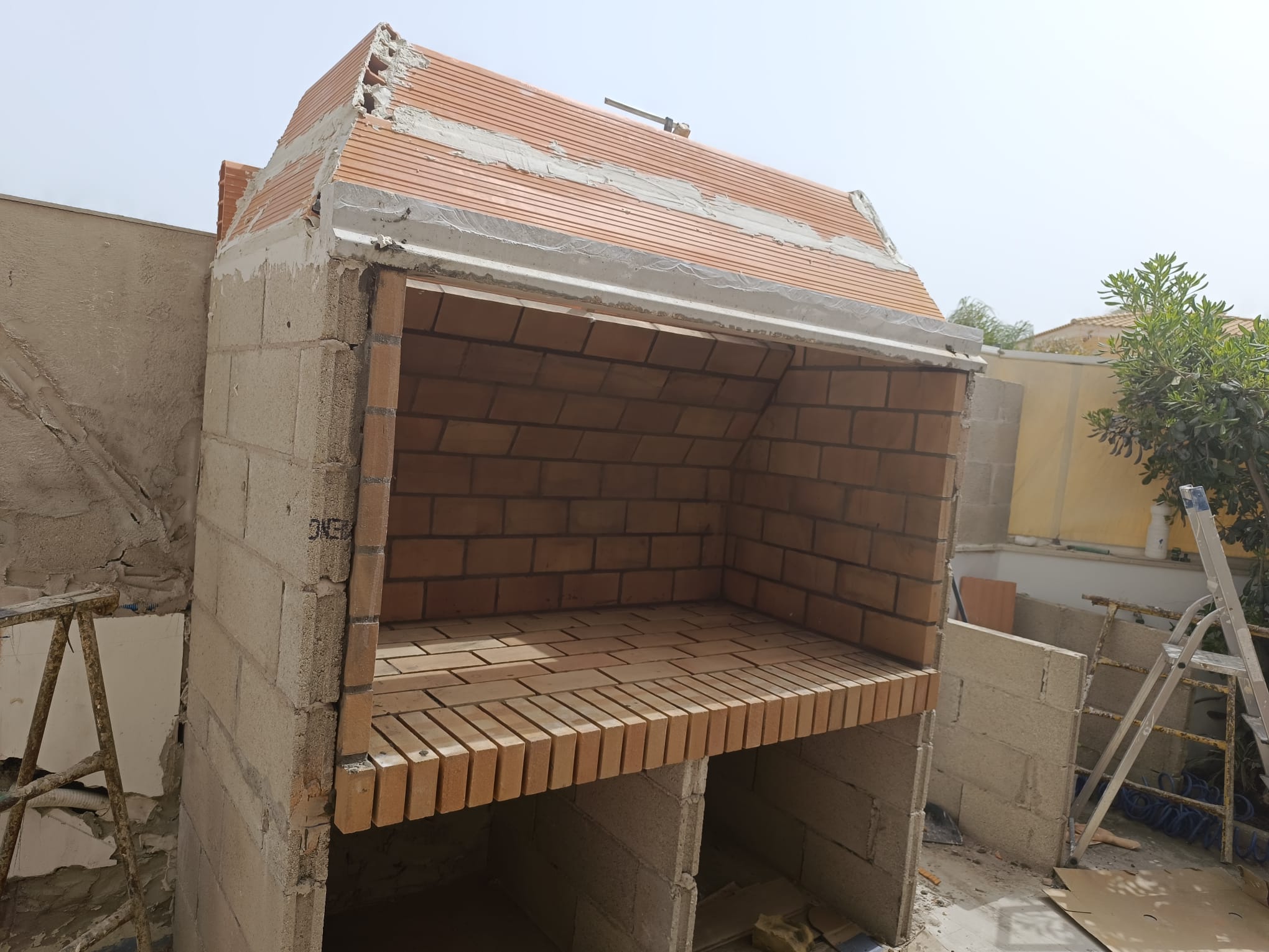 Construcción de horno y barbacoa